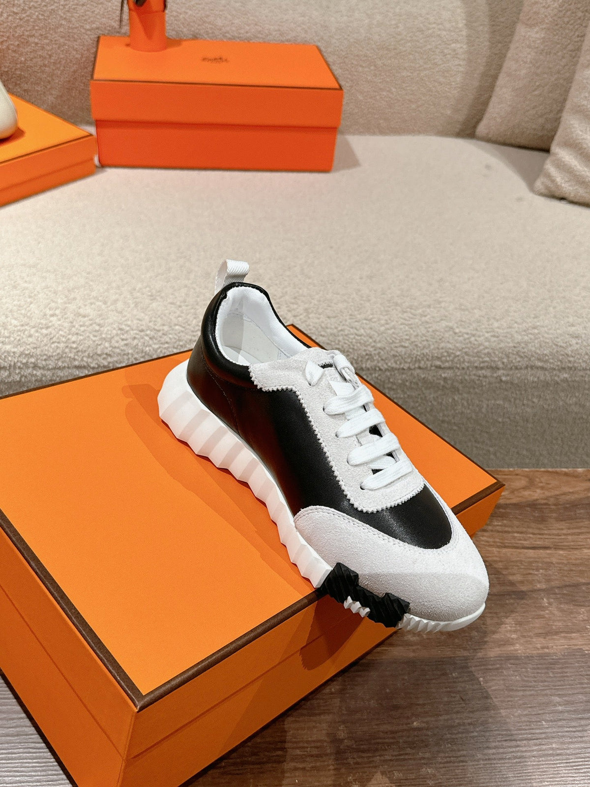 HERMES MAINLAND SNEAKER IN PALE GRAY SUEDE AND BLACK CALFSKIN